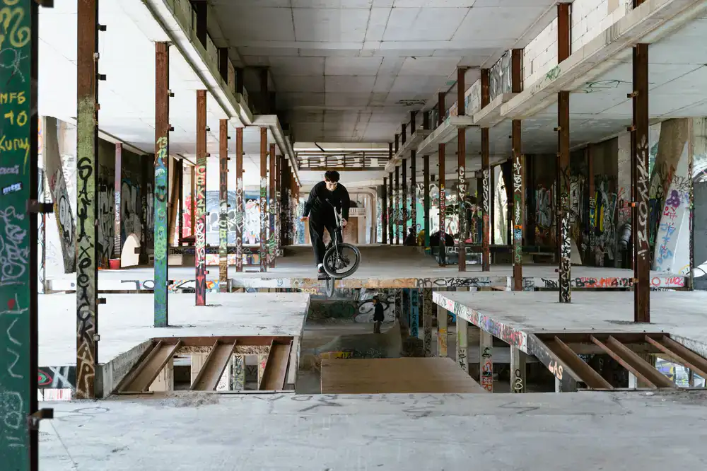 Rider performing a trick on the indoor halfpipe